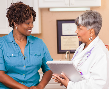 woman talking with doctor